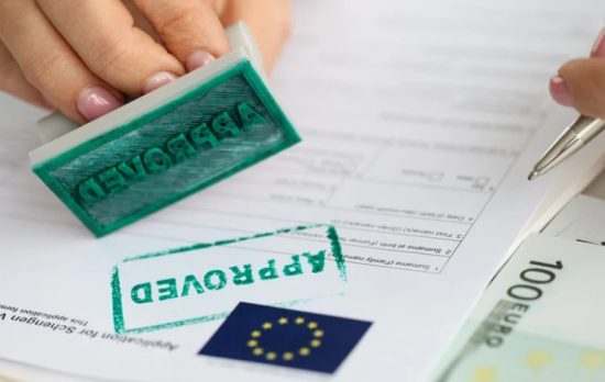 how to get work permit stamp on passport in canada